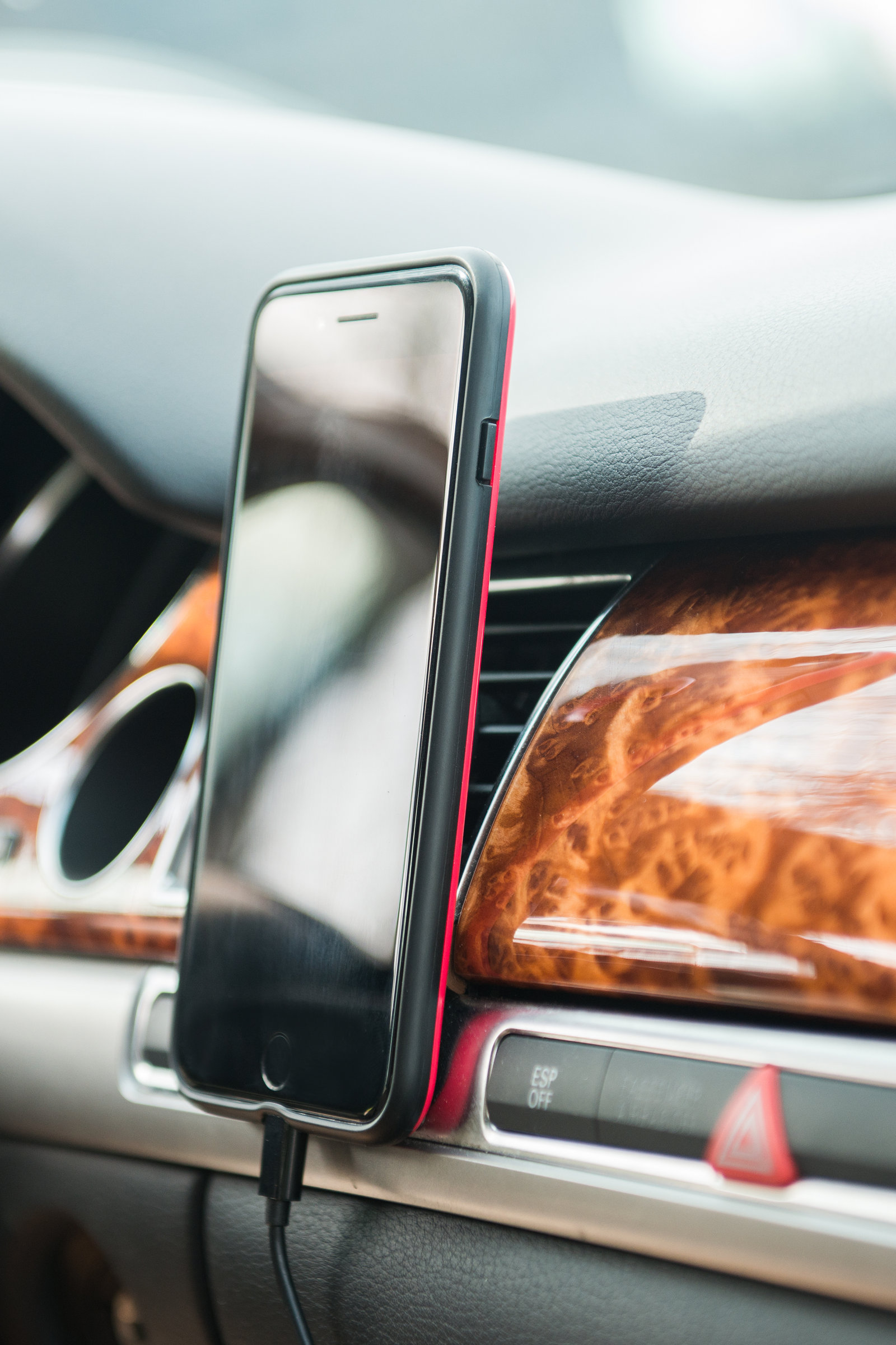 Mobile phone on magnet car mount phone holder for GPS.